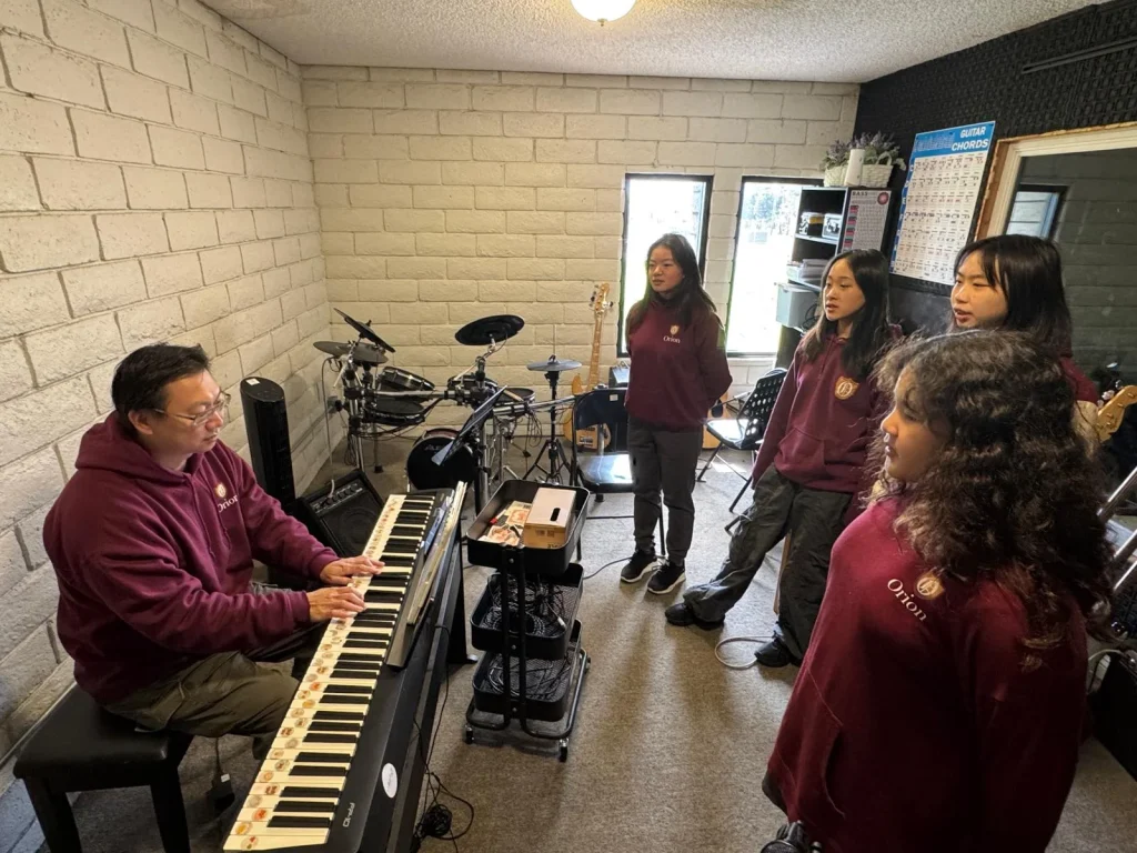 Music-Instructor-in-Piano-Class